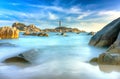 Ke Ga Lighthouse sunset with surf patted smoother reefs create clouds on the sea Royalty Free Stock Photo