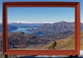 Kea in a photo frame at Treble Cone ski field, Southern Alps, Wanaka, New Zealand