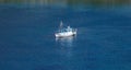 Kea, Tzia, Greece. Traditional fishing boat, trawler moored at Otzias cove