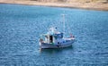 Kea, Tzia, Greece. Traditional fishing boat, trawler moored at Otzias cove