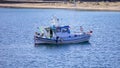 Kea, Tzia, Greece. Traditional fishing boat, trawler moored at Otzias cove Royalty Free Stock Photo