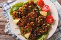 Kebab from Calamari on skewers with vegetables. horizontal top v Royalty Free Stock Photo