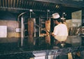 Kebab chef cutting meat