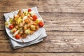 Kebab chicken, zucchini and tomatoes on skewers in a plate. Wooden table. Copy space Royalty Free Stock Photo