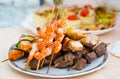 Kebab. Delicacies and snacks in the buffet. Seafood. A gala reception. Banquet. Catering Royalty Free Stock Photo