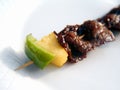 A kebab kebob shashlyk on a white plate Royalty Free Stock Photo