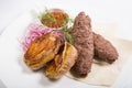 Kebab with potato garnish Royalty Free Stock Photo