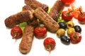 Kebab rolls olives and pepper over white Royalty Free Stock Photo