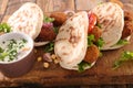 Sandwich with pita bread, falafel and vegetable Royalty Free Stock Photo