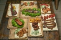 Kebab set and grilled mackerel salmon on wooden boards