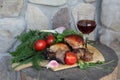 Kebab with vegetables, herbs and red wine