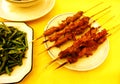 kebabs lamb, stir-fried ferns Royalty Free Stock Photo