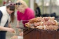 Kebabs ready for cooking on an outdoor BBQ