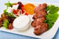 Kebapcheta served with salad Royalty Free Stock Photo