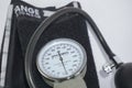 KEBUMEN, INDONESIA Ã¢â¬â AUGUST 1, 2021: Stethoscope and blood pressure checker or sphygmomanometer on a white background