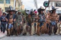 Kechwa men performing ritual dance on the street