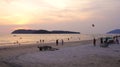 KEDAH, LANGKAWI, MALAYSIA - APR 08th, 2015: Tourists having romantic moment during sunset at Cenang Beach