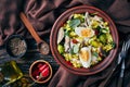 Kedgeree in a clay bowl, top view