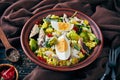 Kedgeree in a clay bowl, top view