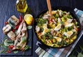 Kedgeree with flaked hot smoked fish, closeup