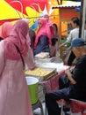 Kediri, Indonesia - 03 January 2020 : Bakpia sellers are serving buyers. Bakpia Is Traditional Food/cake/bakery From Yogya Indones