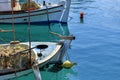 The keels of two old fishing schooners anchored in the clear waters of the Ionian Sea
