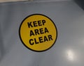 Keep area clear sign in red with white letters Royalty Free Stock Photo