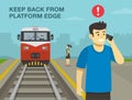 Keep back from platform edge warning. Railroad safety rules and tips. Young man waiting his train and calling the phone on platfor