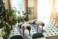 Keep the body moving and the mind still. two young men doing planks during a yoga routine at home.