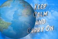 Keep calm and carry on text next the Earth with political map on blue sky and white clouds background. Perspective 3D view Royalty Free Stock Photo