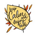 Keep calm and enjoy fall. Hand drawn vector holiday phrase. Isolated on white background.