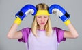 Keep calm and get rid of headache. Beat headache. Girl boxing gloves tired to fight. Strong woman suffer pain. Girl Royalty Free Stock Photo