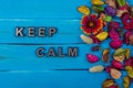 keep calm text on blue wood with flower Royalty Free Stock Photo