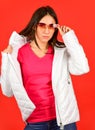 Keep calm and wear cool glasses. Cute Pretty girl hood jacket red background. Fashion has to reflect who you are. Woman