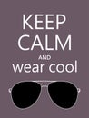 Keep Calm And and wear cool sunglasses quote on dark background. Motivational funny poster Royalty Free Stock Photo