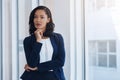 Keep on dreaming, seeking and achieving. a young businesswoman looking thoughtful in an office.