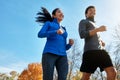 We keep each other motivated. a sporty young couple exercising together outdoors. Royalty Free Stock Photo