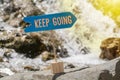 Keep going sign board on rock Royalty Free Stock Photo