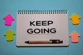 Keep Going write on a book  on office desk. Christian faith concept Royalty Free Stock Photo