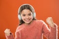 Keep hands free with wireless modern technology. Girl child listen music modern wireless headphones. Listen for free