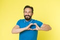 Keep healthy heart beat. Happy man form heart shape. Showing love gesture. Valentines day. Cardiovascular health Royalty Free Stock Photo