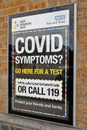 Keep London Safe and NHS Test and Trace poster sign about Covid symptoms, go for a test. Protect your friends and family.