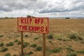 Keep off the crops sign in an english field in the country