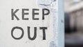 Keep out. The inscription on the wall of the building. Royalty Free Stock Photo