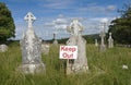 Keep out sign on a cemetery