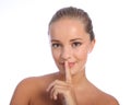 Keep quiet secret smile from beautiful woman Royalty Free Stock Photo