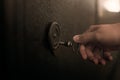 keep secret, hand opens armored door with key, gain access Royalty Free Stock Photo