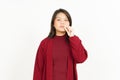 Keep Secret lip shut Of Beautiful Asian Woman Wearing Red Shirt Isolated On White