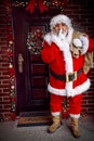 Keep secret- Santa Claus arrives with the Christmas present Royalty Free Stock Photo