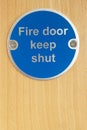 Keep shut sign on fire door